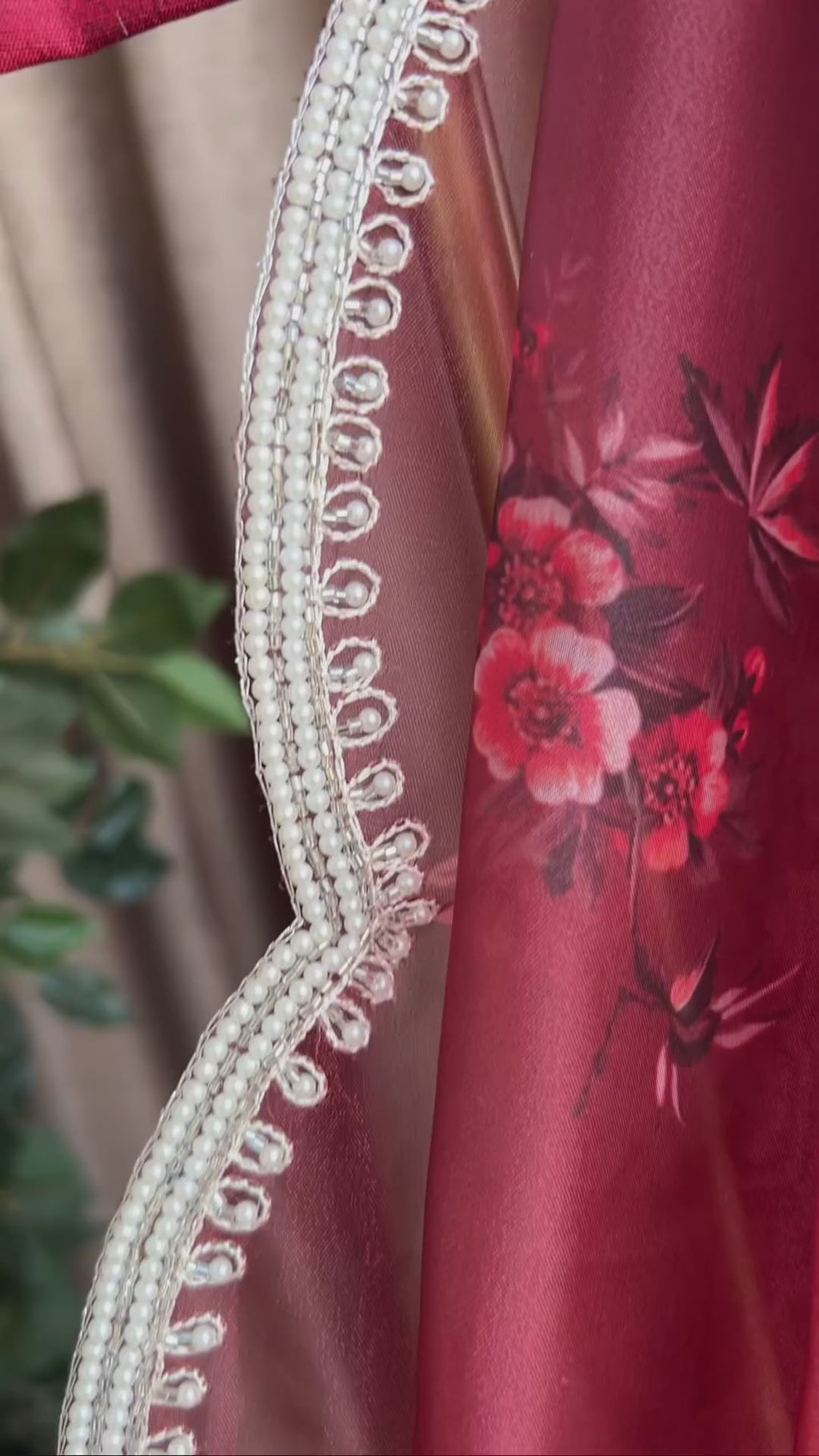 Deep maroon floral organza saree with hand worked blouse