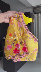 Peach organza saree with yellow floral hand work blouse