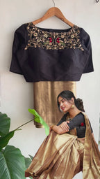 Golden tissue saree with black hand work blouse