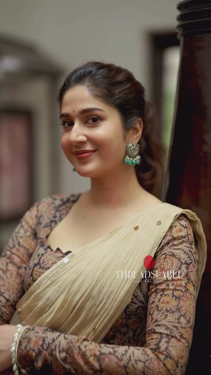 Cream malai chanderi saree with Ajrak print blouse