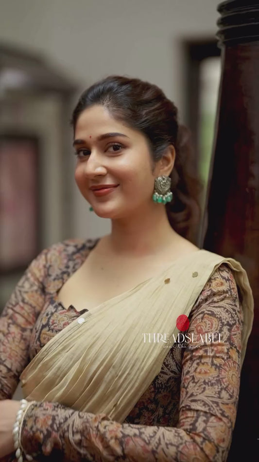 Cream malai chanderi saree with Ajrak print blouse