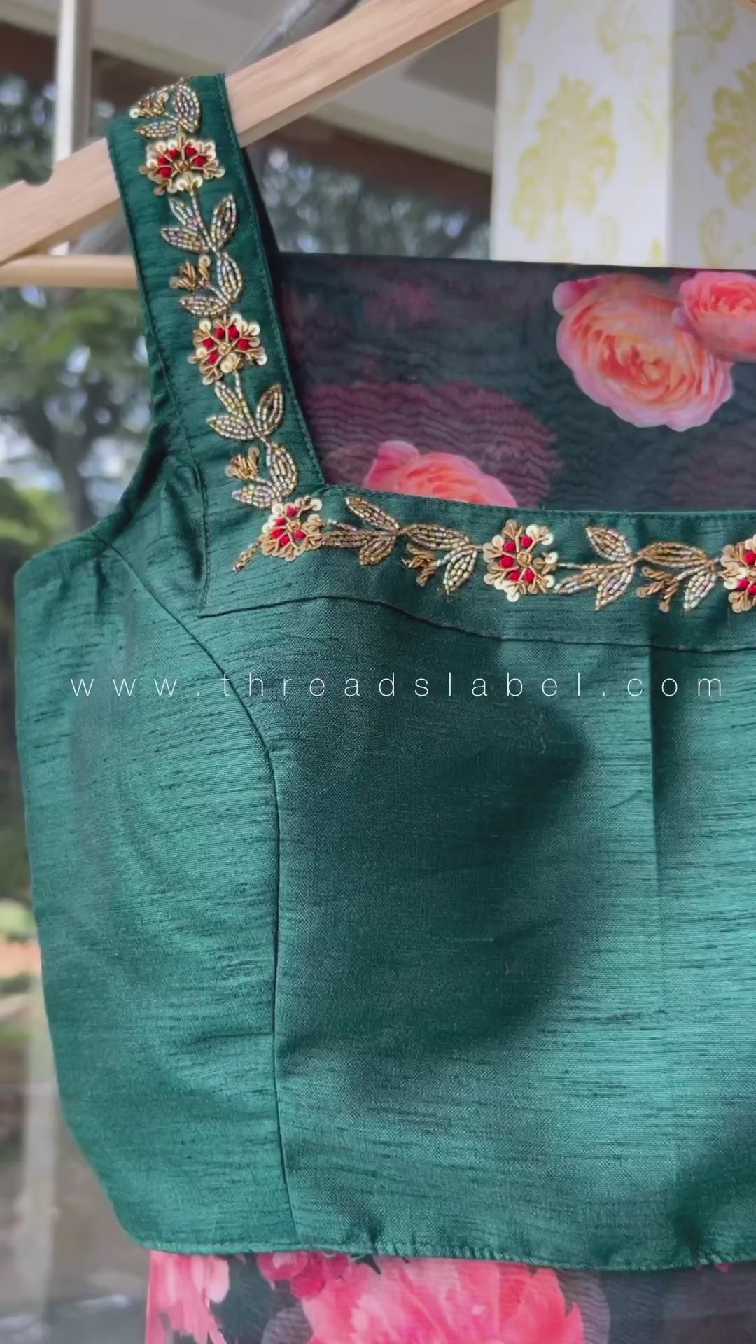Bottle green organza saree with green handworked blouse