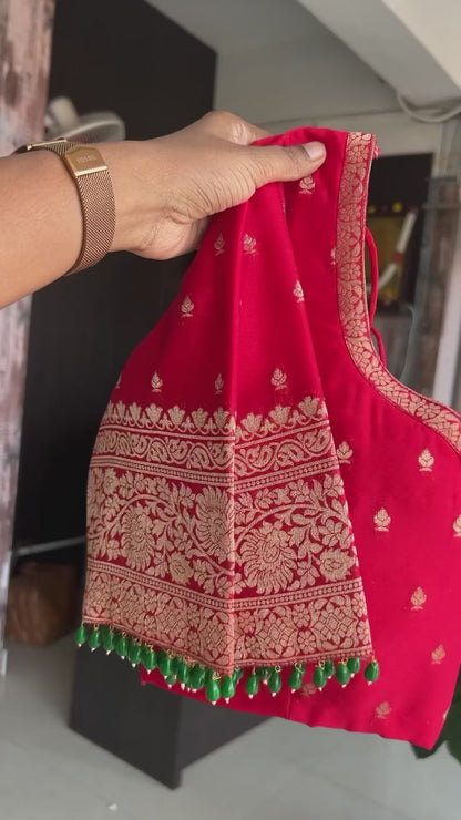 Green georgette banarasi saree with red hand worked blouse