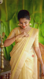 Gold kota doria saree with hand work blouse