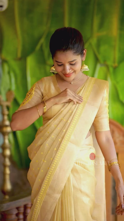 Gold kota doria saree with hand work blouse
