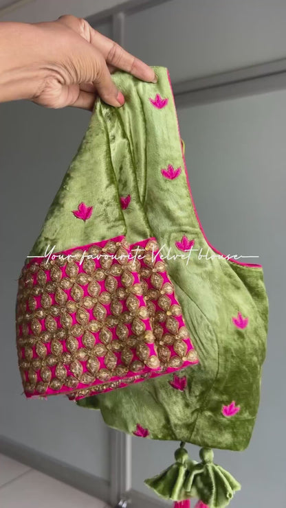 Pink floral organza saree with green velvet embroidered blouse