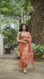 Pastel peach chiffon saree with brown hand work blouse