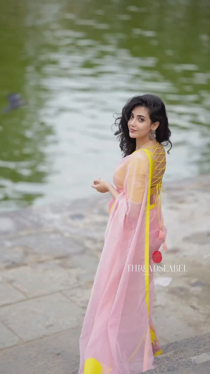 Peach organza saree with yellow hand work blouse