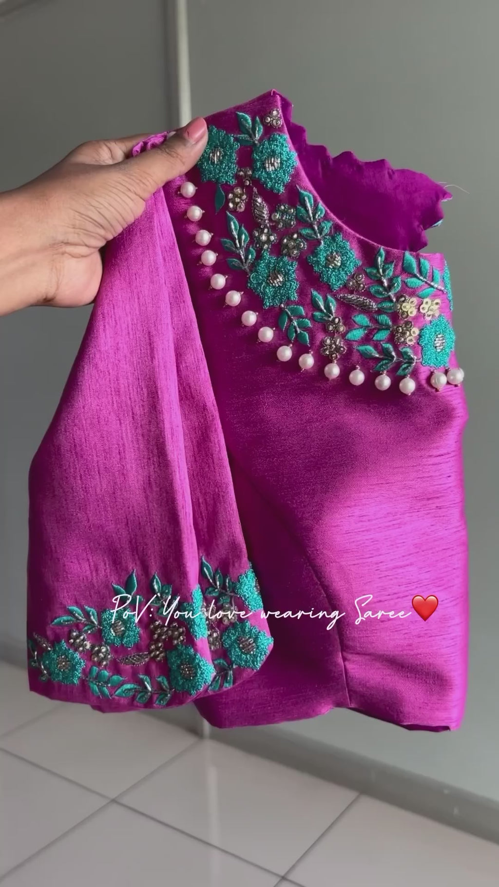 Soft blue tissue saree with pink hand embroidered blouse