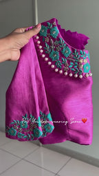 Soft blue tissue saree with pink hand embroidered blouse
