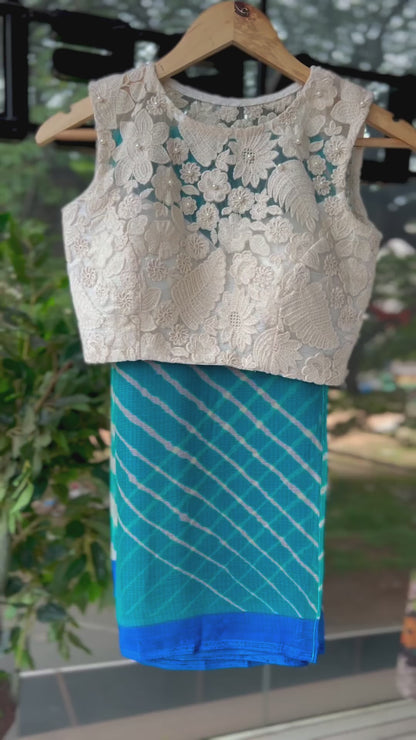 Blue chiffon stripped saree with embroidery blouse