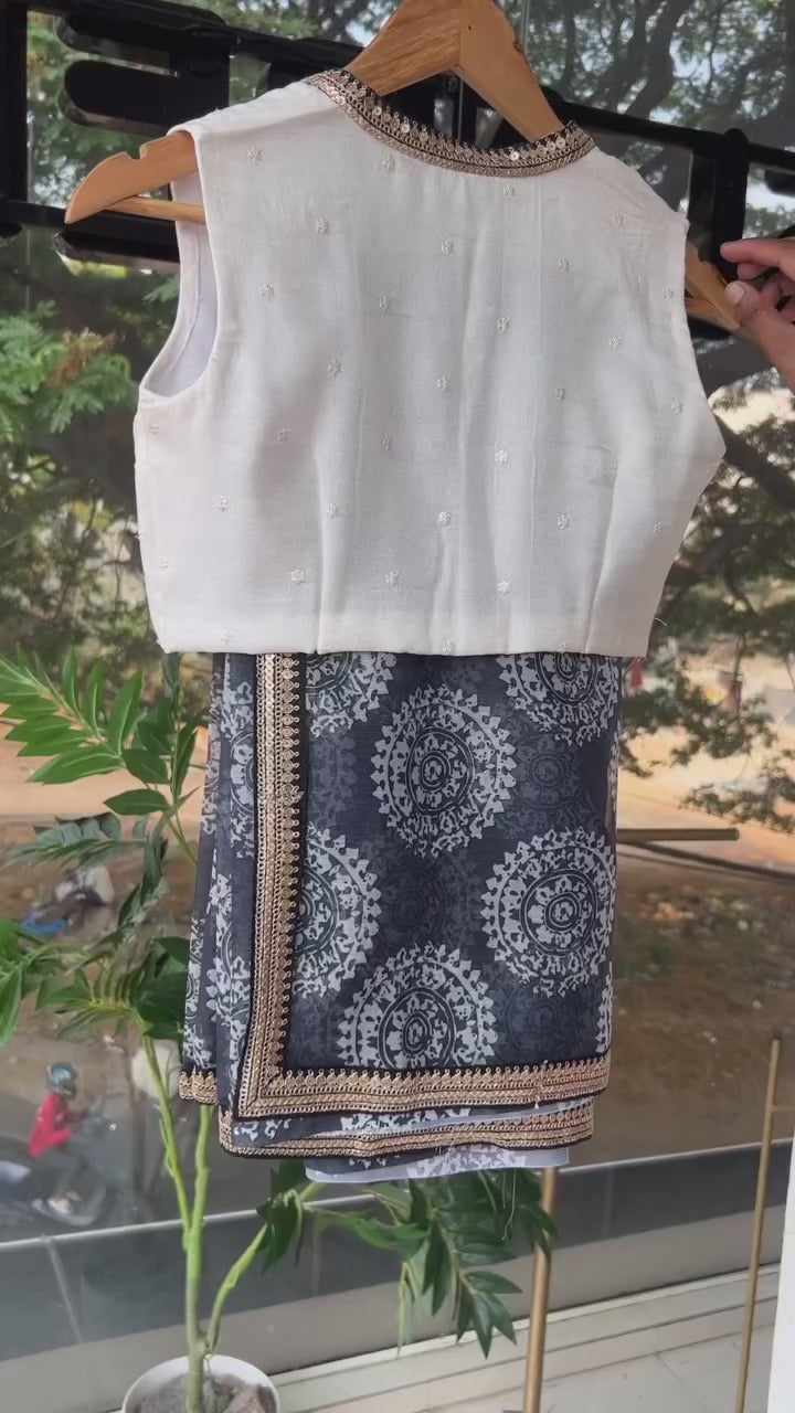Grey chiffon printed saree with white hand work blouse