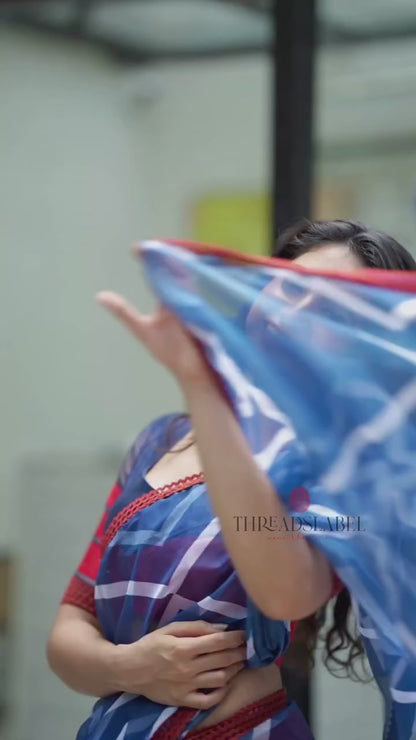 Blue maroon organza saree with patterned blouse