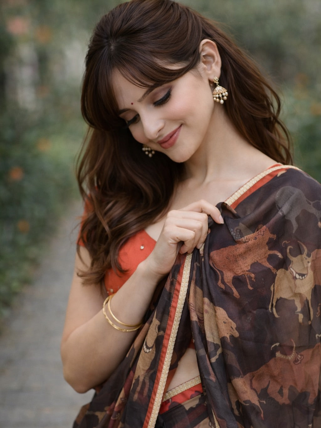 Black cow kota saree with paisley hand work blouse