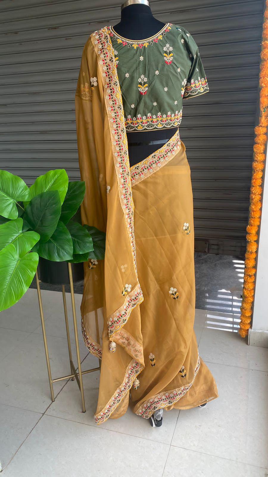 Light orange organza saree with silk embroidery blouse - Threads
