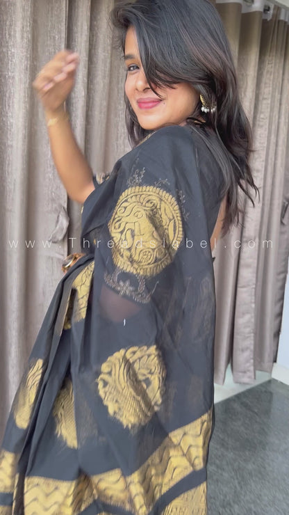 Black and gold chanderi silk saree with Aari worked blouse