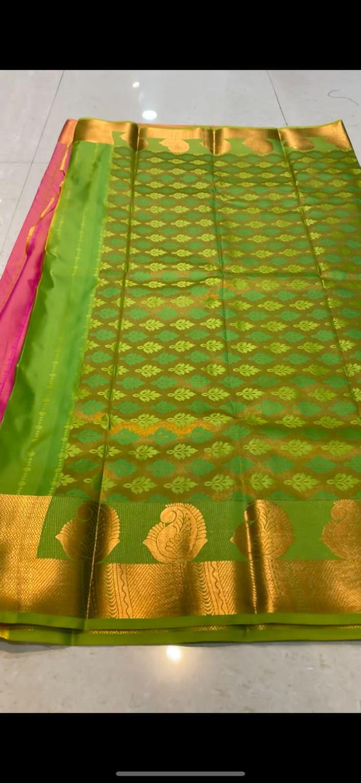 Parrot Green and Cream color pochampally ikkat pure silk handloom saree  with all over printed design