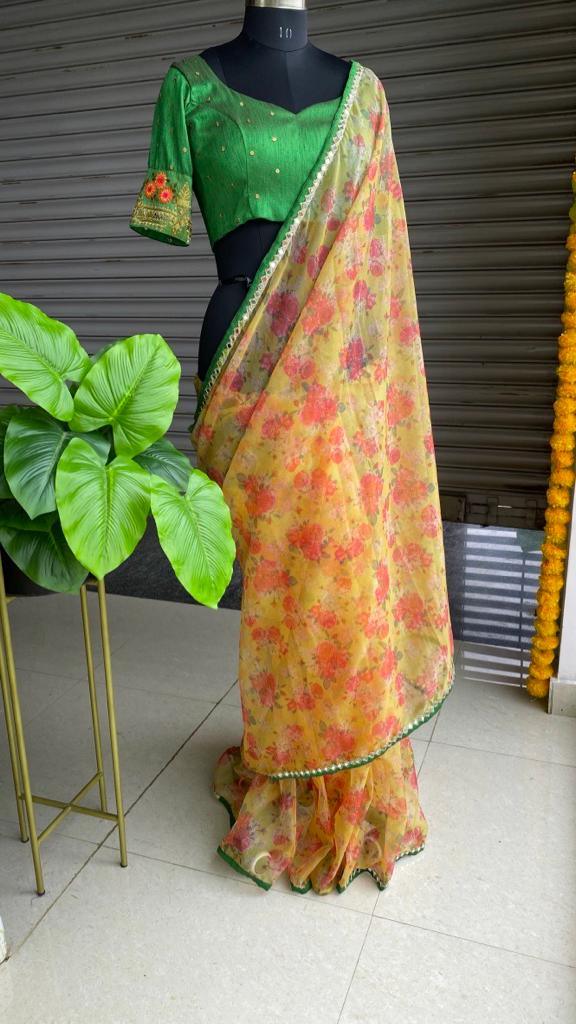 Yellow organza saree with red hand worked Blouse - Threads