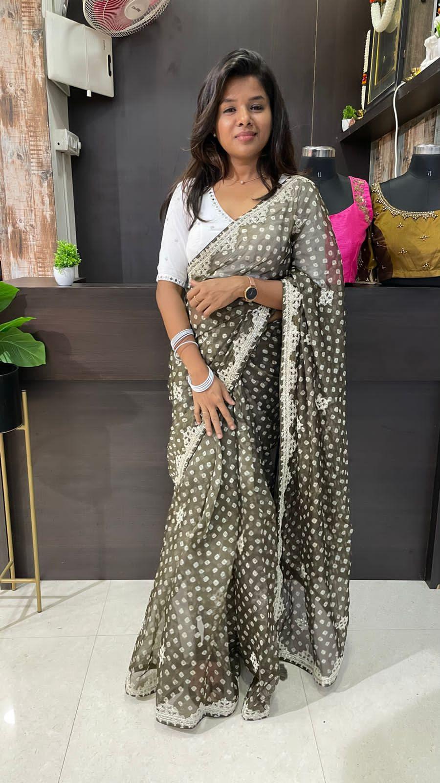 Bottle green Organza saree with heavy embroidery blouse - Threads