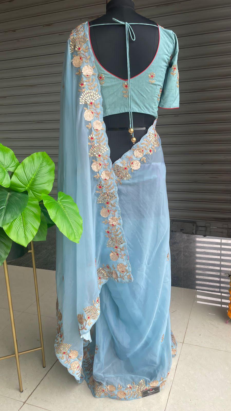 Sky blue organza saree with hand worked Blouse - Threads