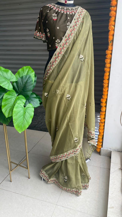 Mehandi green organza saree with silk embroidery blouse - Threads