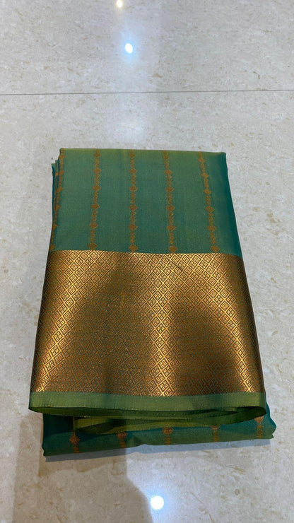Green and orange silk saree with blouse - Threads