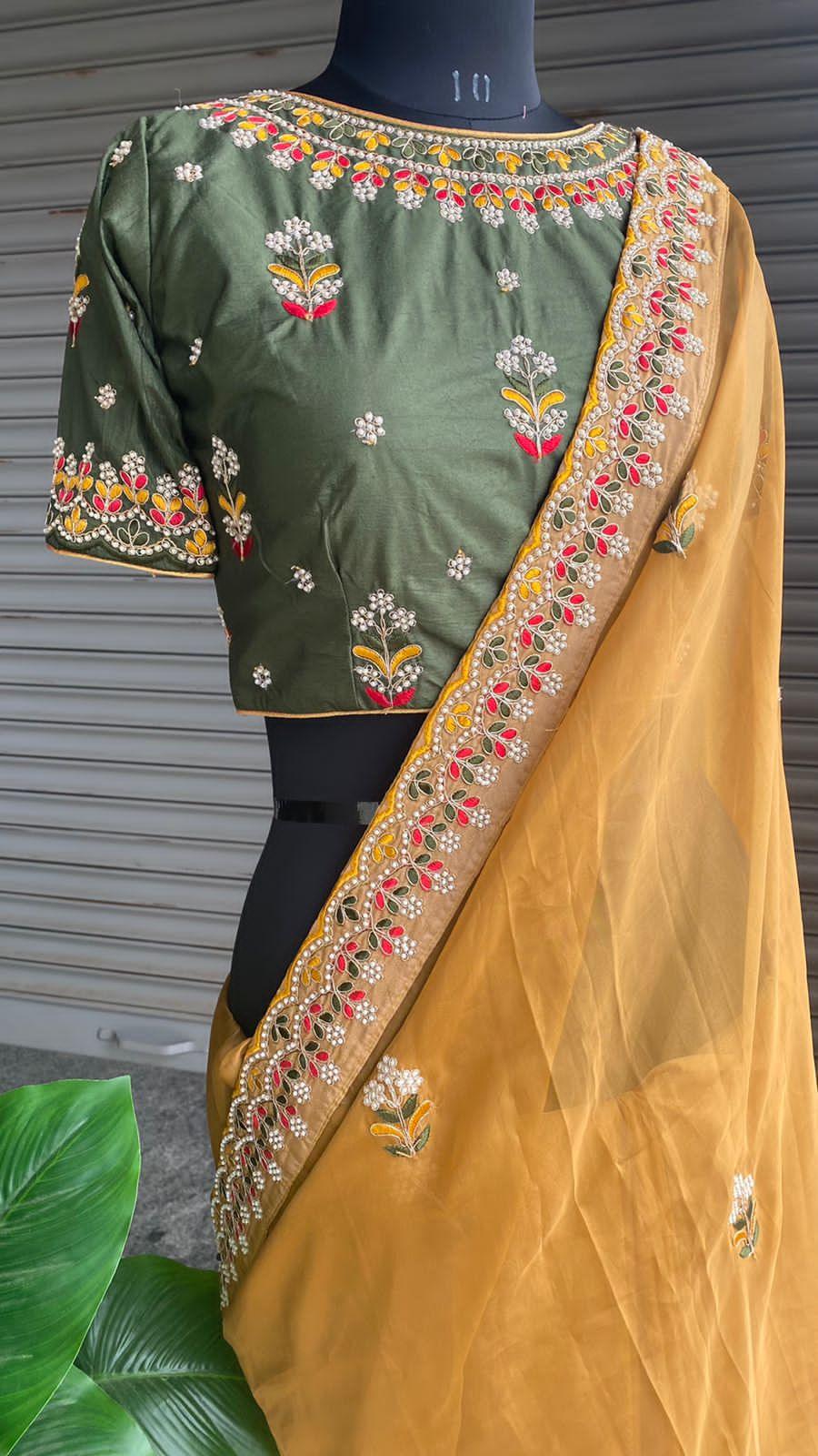 Light orange organza saree with silk embroidery blouse - Threads