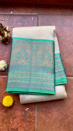 Half white and sea green kanjivaram silk saree with blouse - Threads