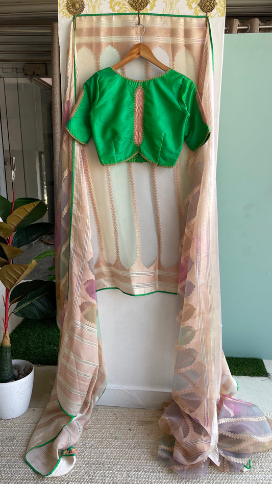 Light pink organza saree with embroidery green blouse