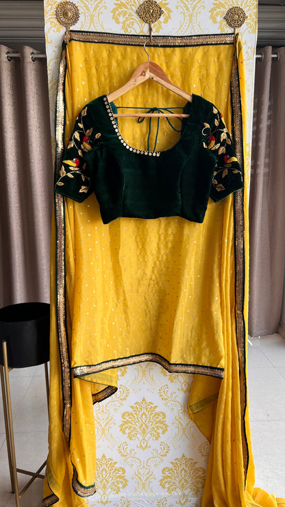 Yellow chinnon saree with green hand worked blouse - Threads