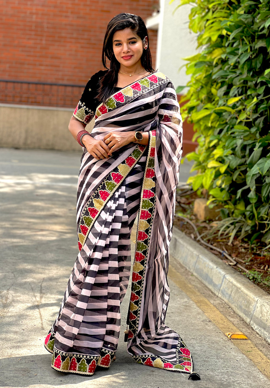 Black and white organza saree with embroidered blouse