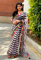 Black and white organza saree with embroidered blouse