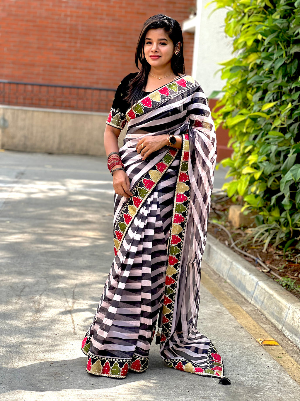 Black and white organza saree with embroidered blouse