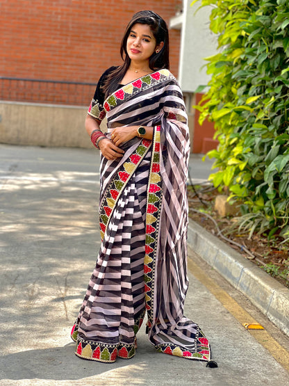 Black and white organza saree with embroidered blouse