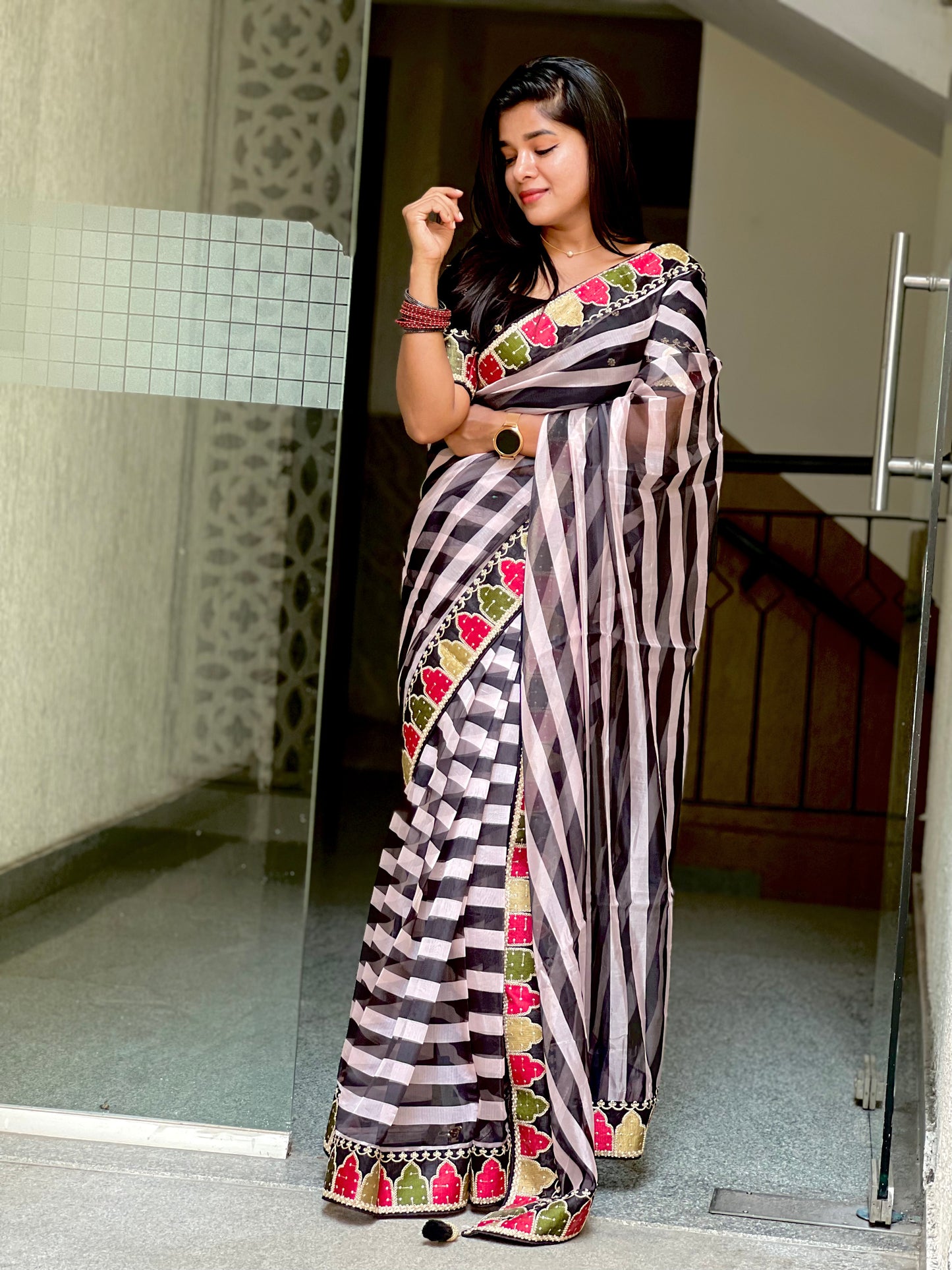 Black and white organza saree with embroidered blouse