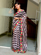 Black and white organza saree with embroidered blouse