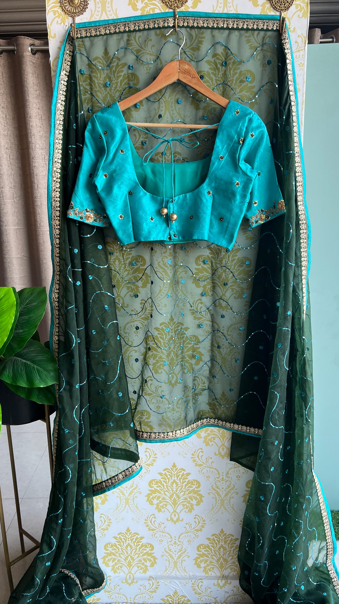 Green organza embroidery saree with hand worked blouse