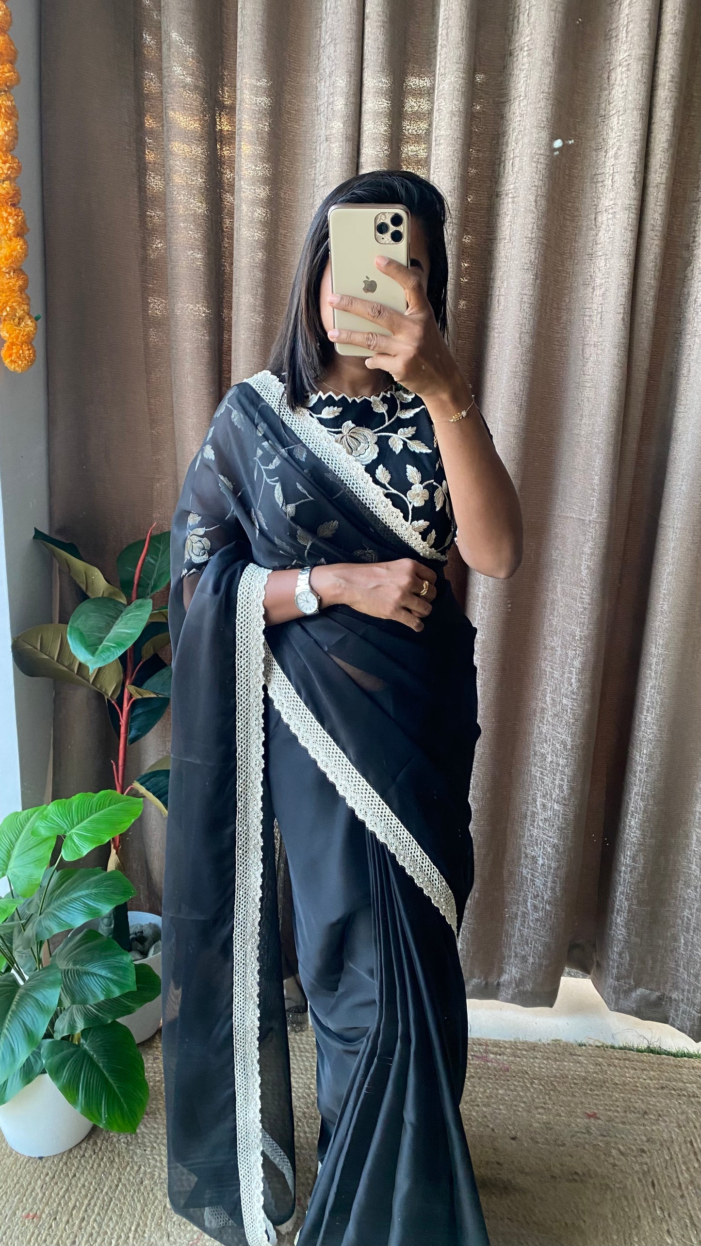 Black soft organza saree with netted embroidery blouse