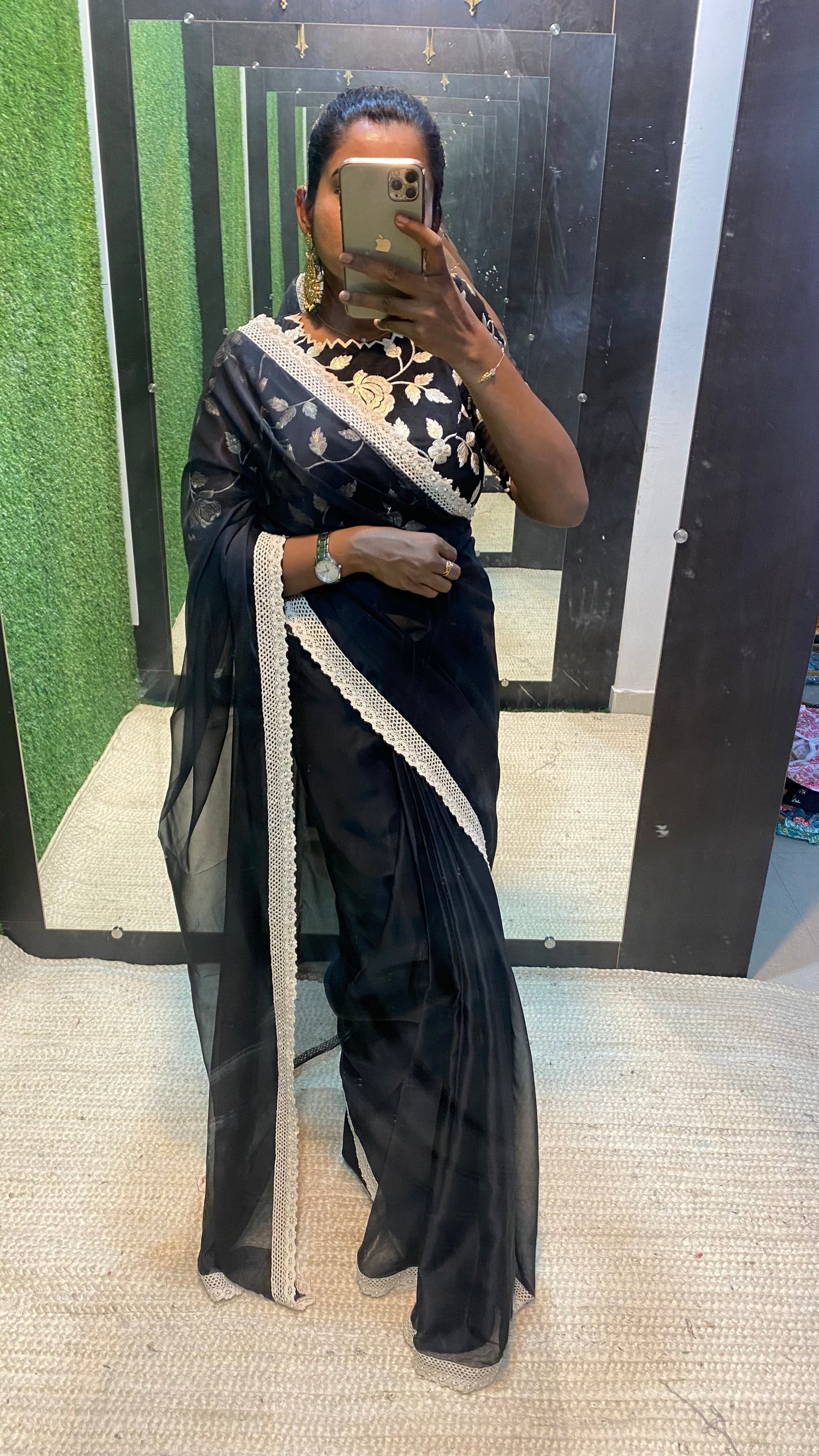 Black soft organza saree with netted embroidery blouse