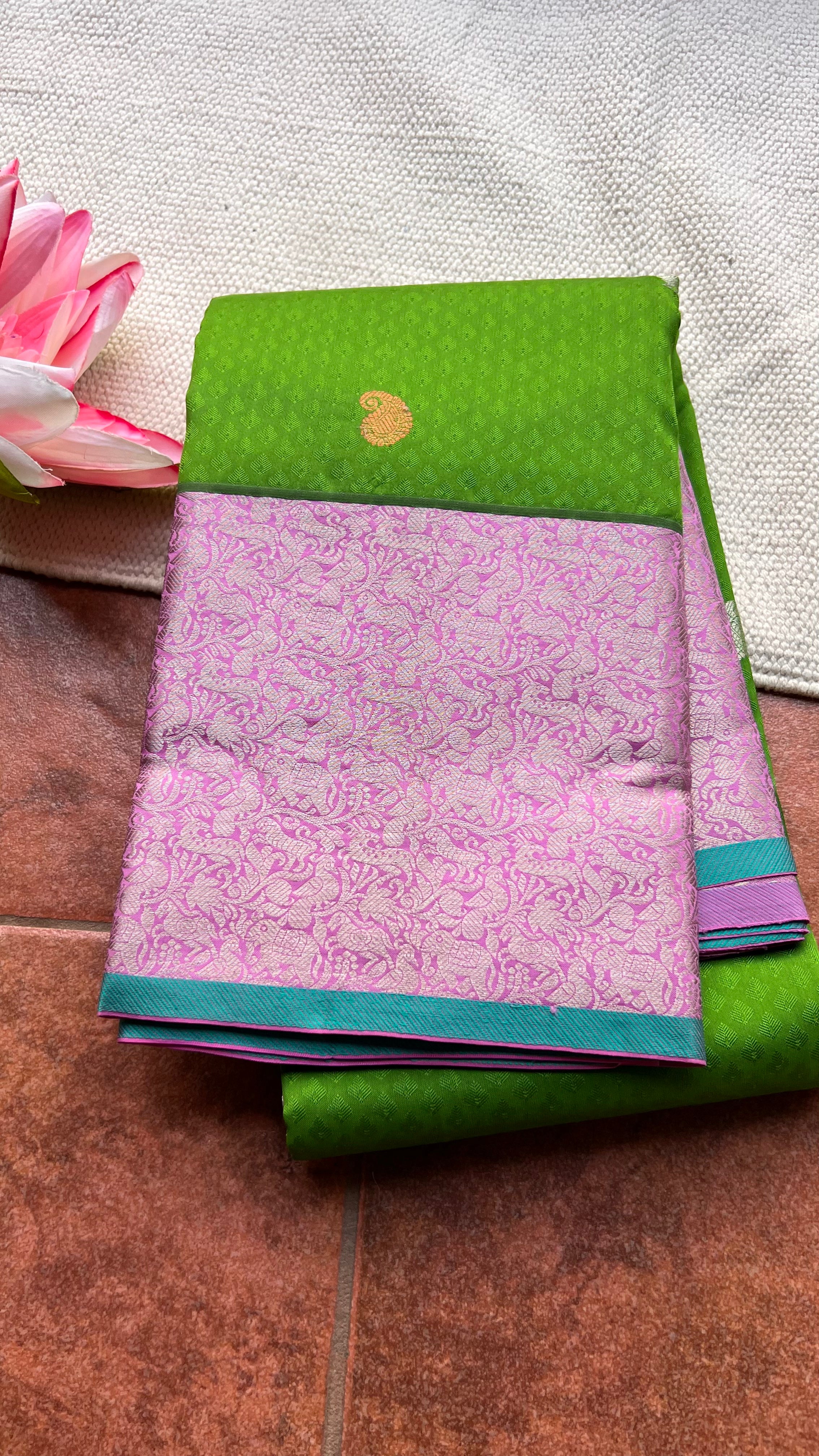 Green and pink kanchipuram silk saree with blouse