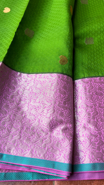 Green and pink kanchipuram silk saree with blouse