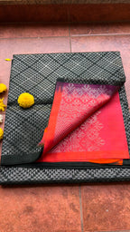 Black and orange matrix kanchipuram silk saree with blouse - Threads