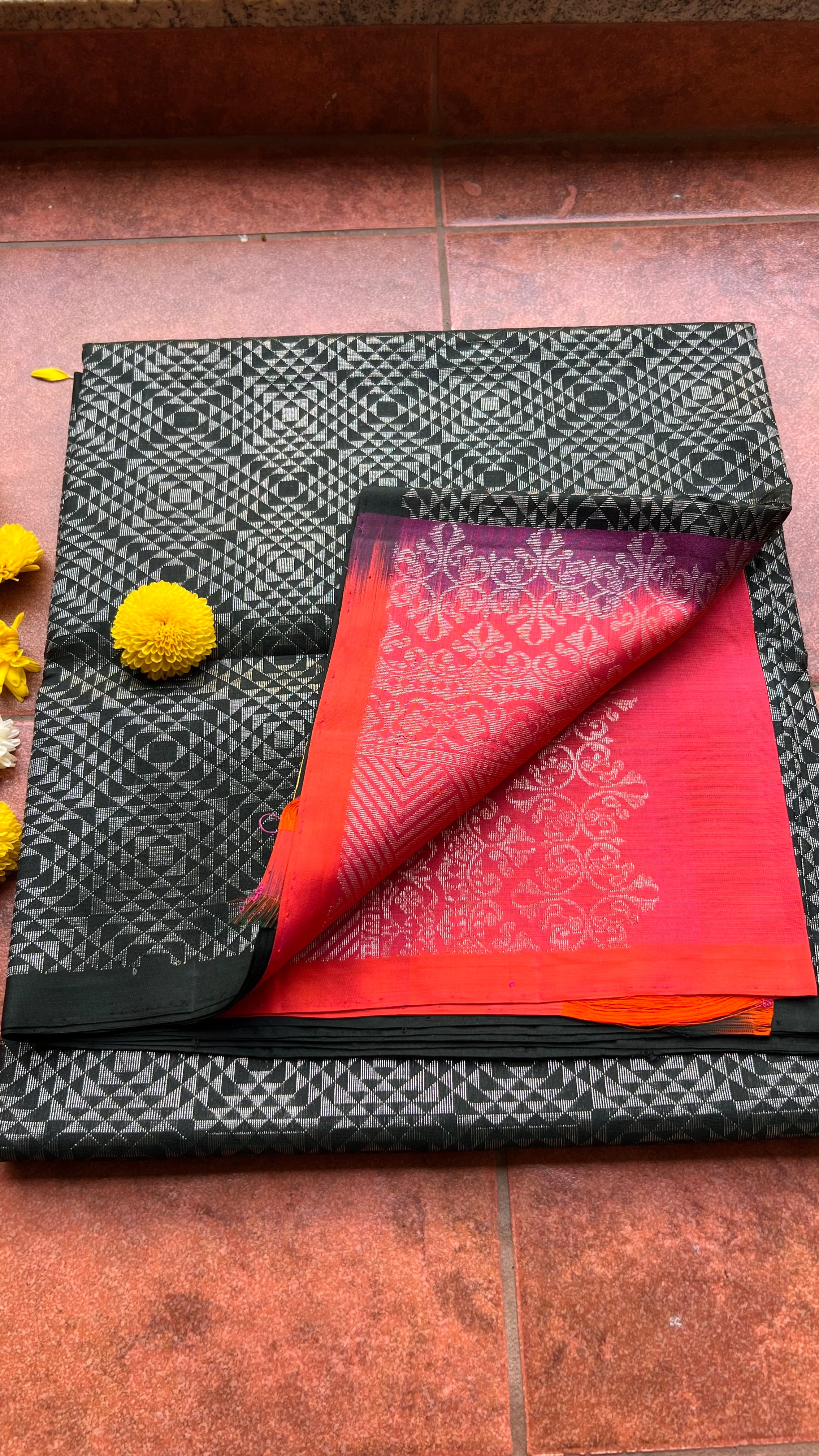Black and orange matrix kanchipuram silk saree with blouse - Threads