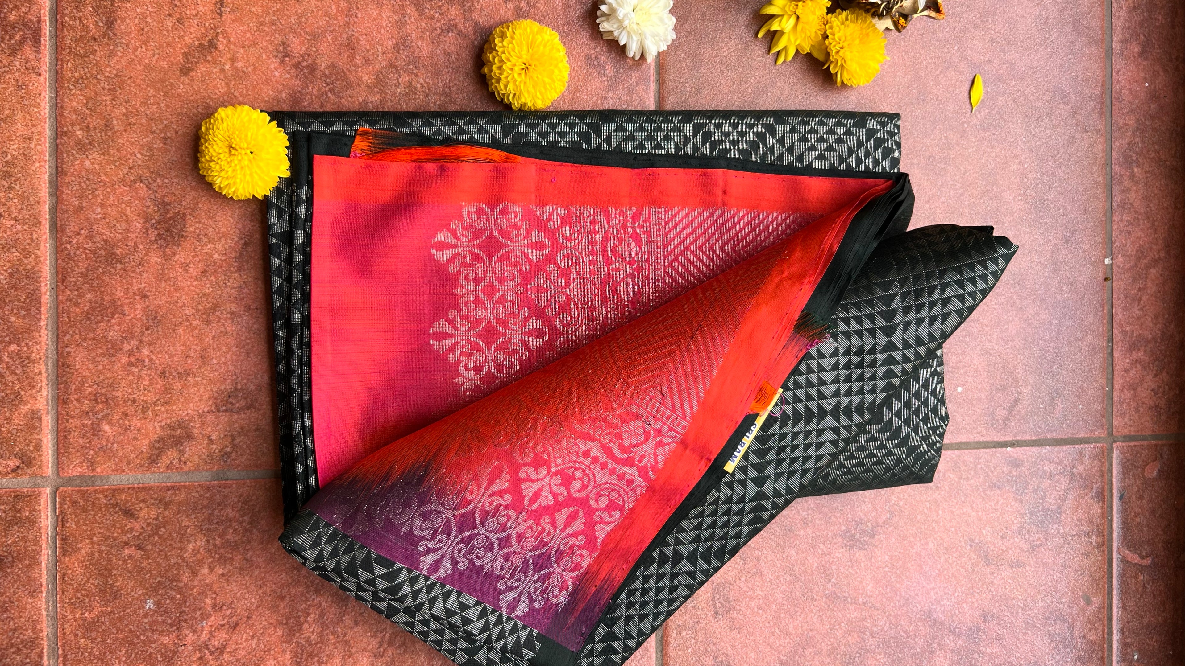 Black and orange matrix kanchipuram silk saree with blouse - Threads