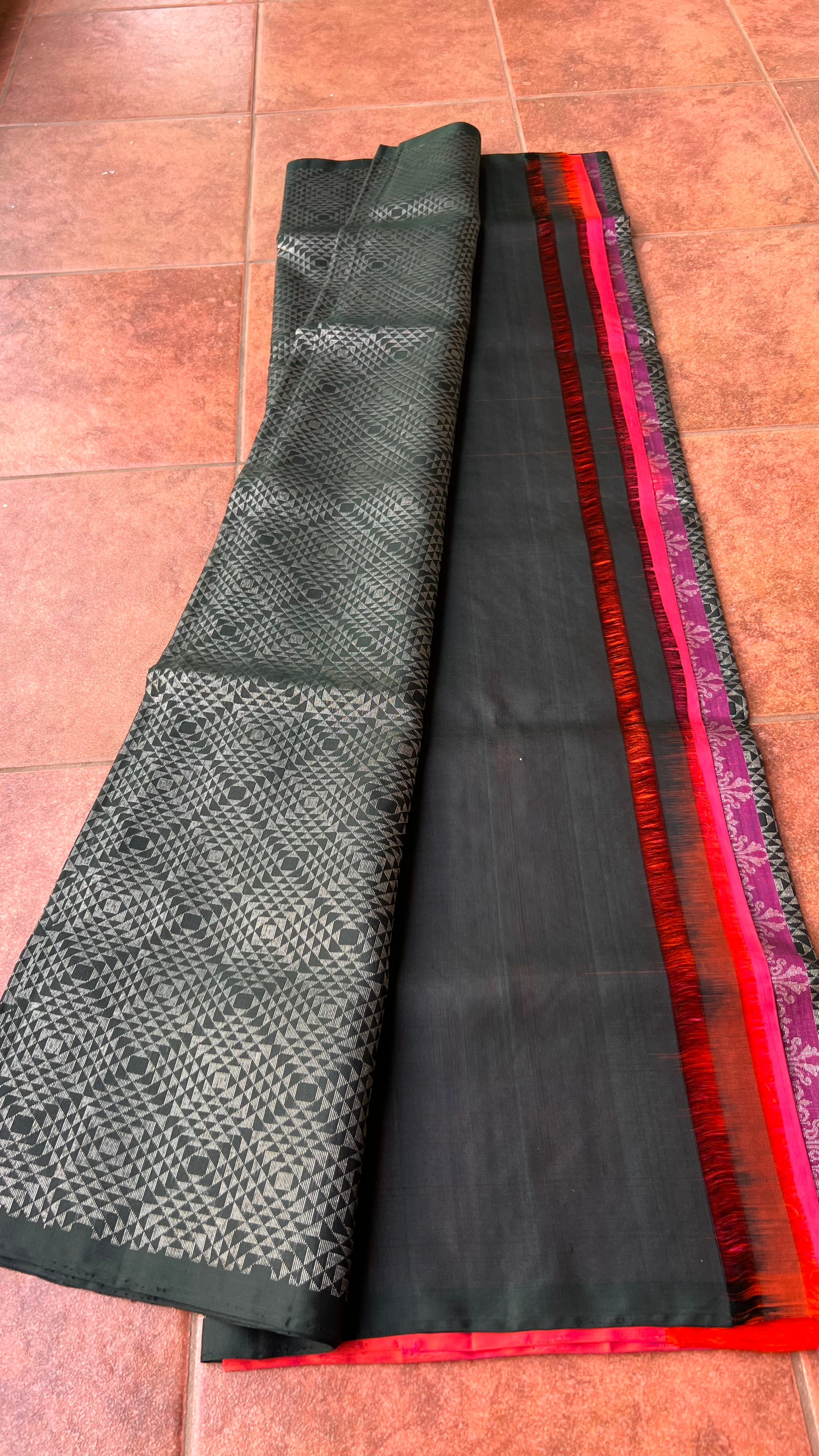 Black and orange matrix kanchipuram silk saree with blouse - Threads