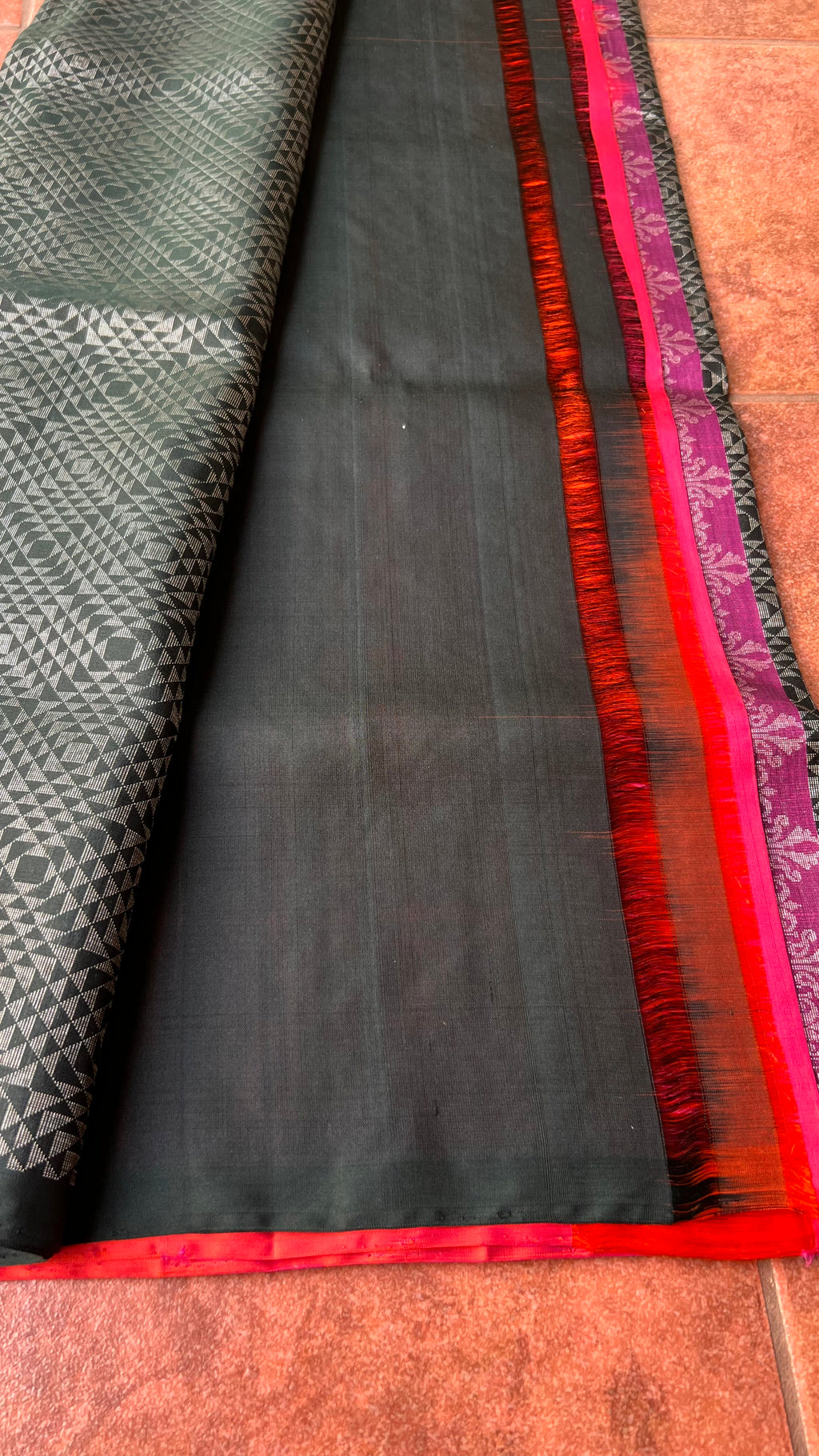 Black and orange matrix kanchipuram silk saree with blouse - Threads