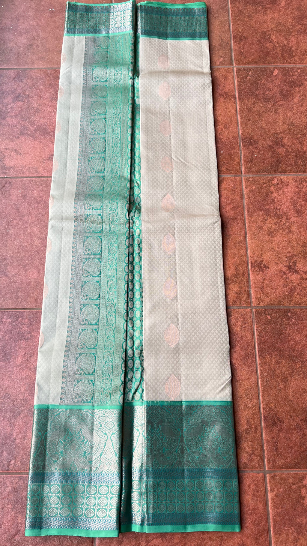 Half white and sea green kanjivaram silk saree with blouse - Threads