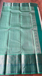 Half white and sea green kanjivaram silk saree with blouse - Threads