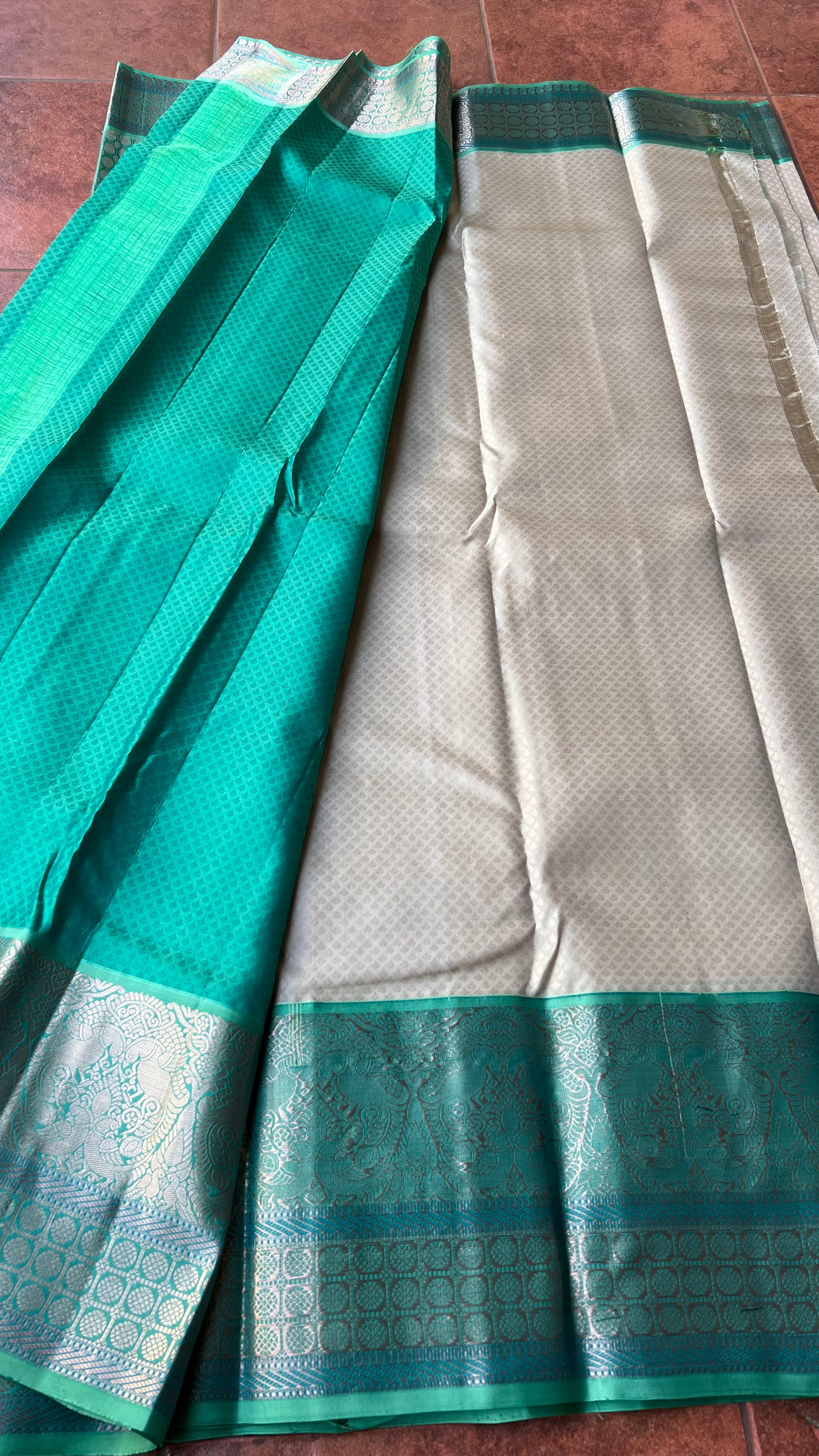 Half white and sea green kanjivaram silk saree with blouse - Threads