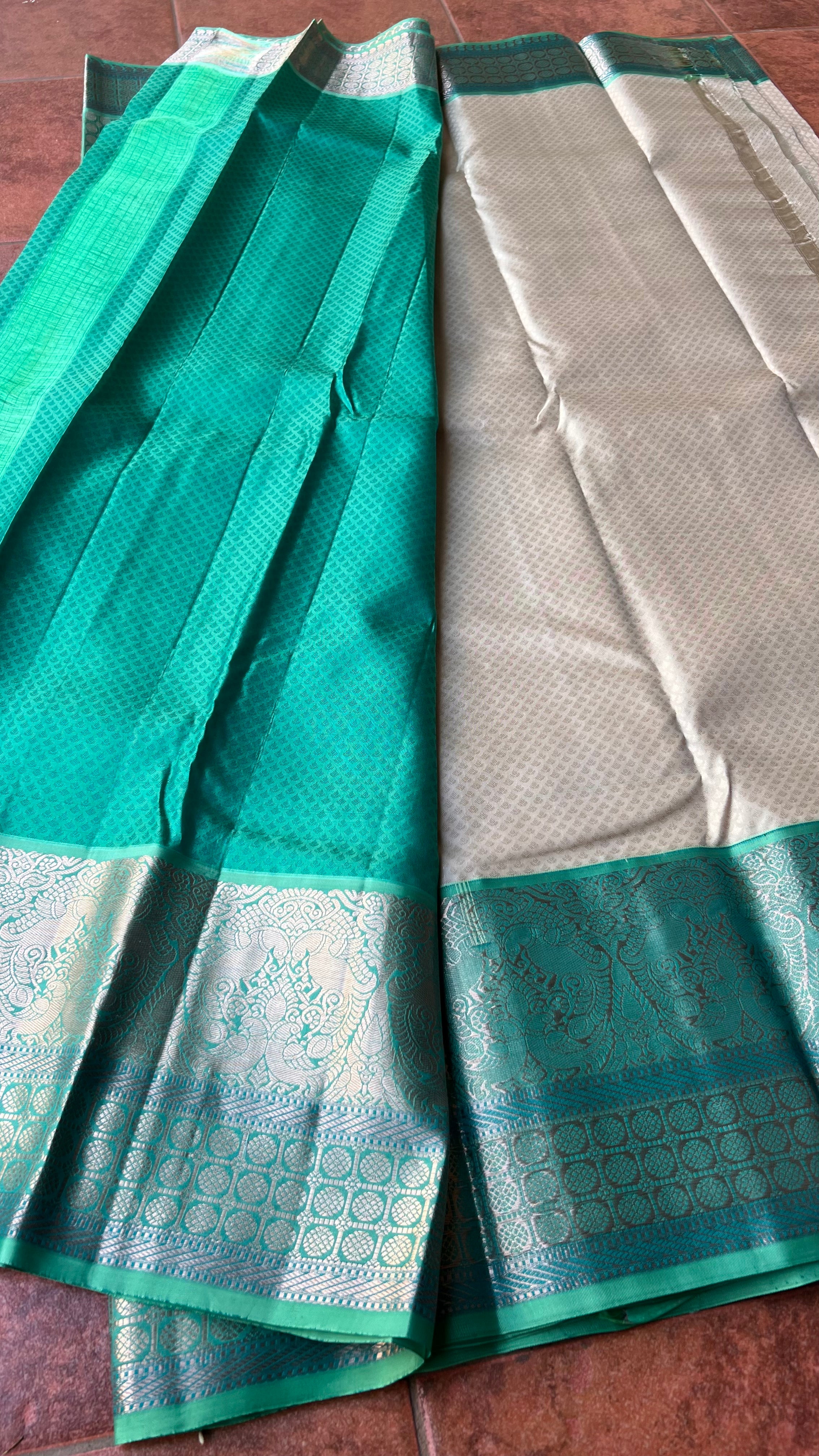Half white and sea green kanjivaram silk saree with blouse - Threads
